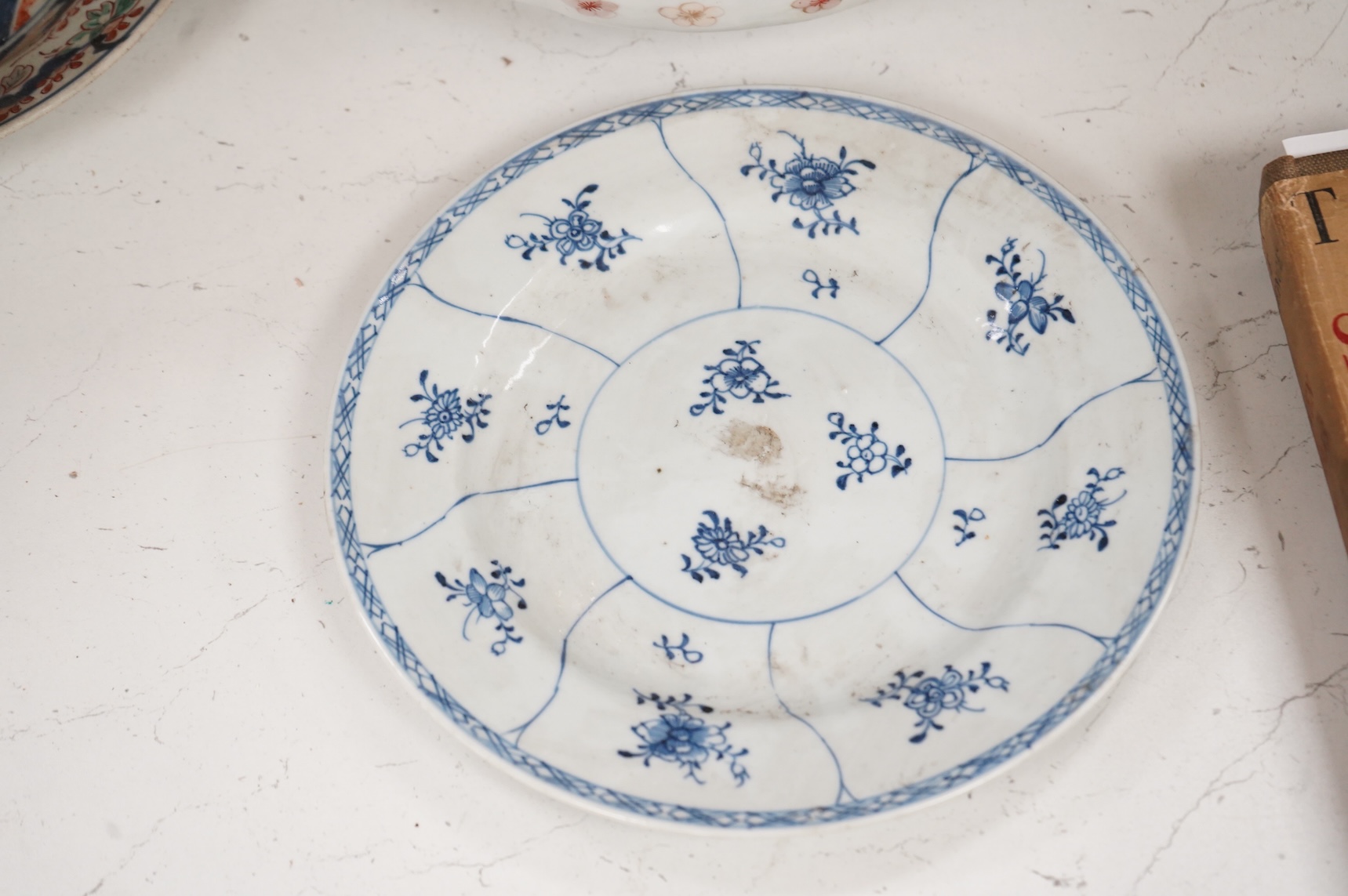 Six 19th century Japanese plates and a bowl, mostly Imari pattern, the octagonal dish with Koransha mark for Fukagawa, largest 24cm in diameter